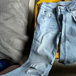 Stretch light denim flared bottom jeans